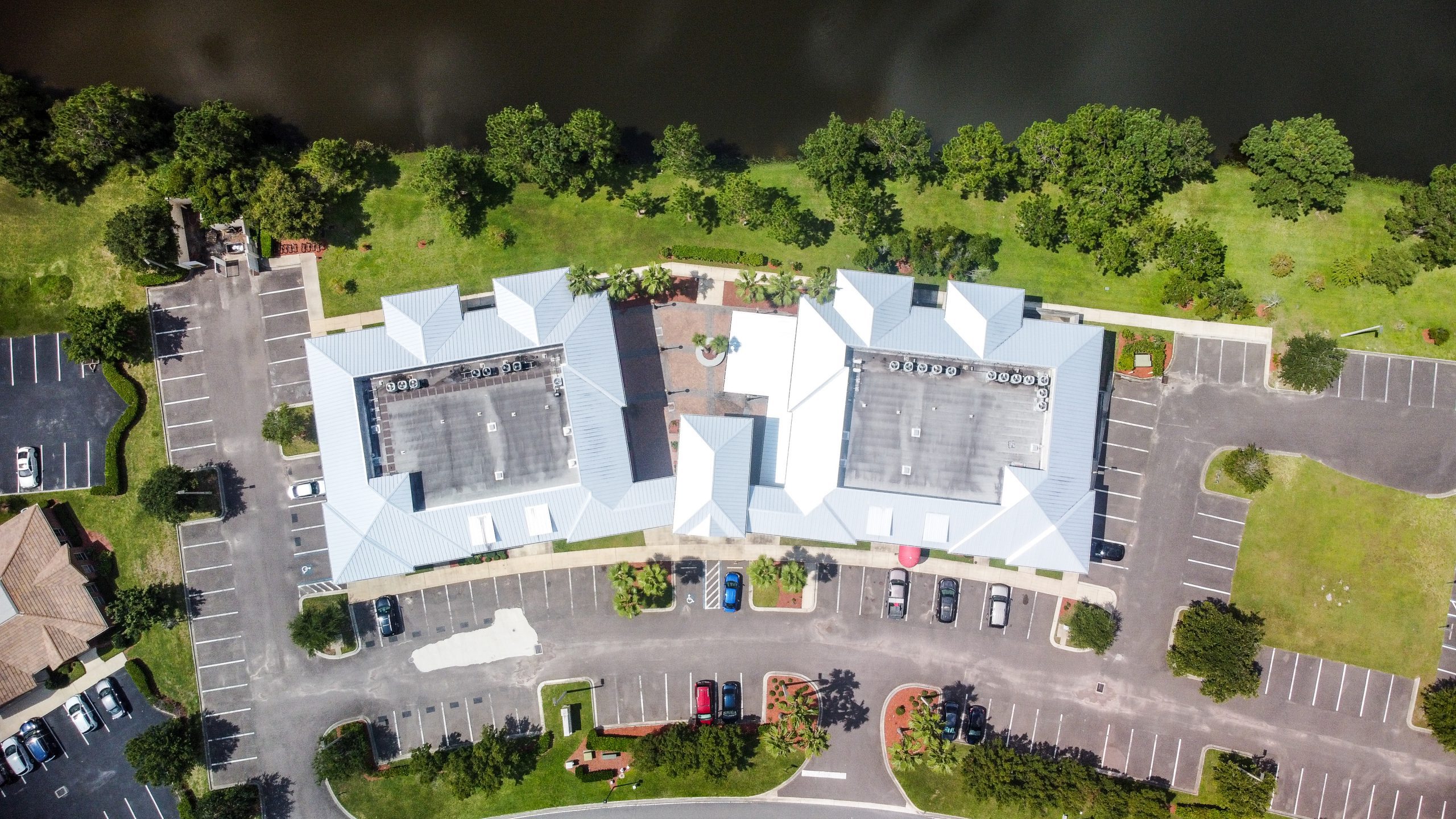An aerial view of a two-story office/retail center.