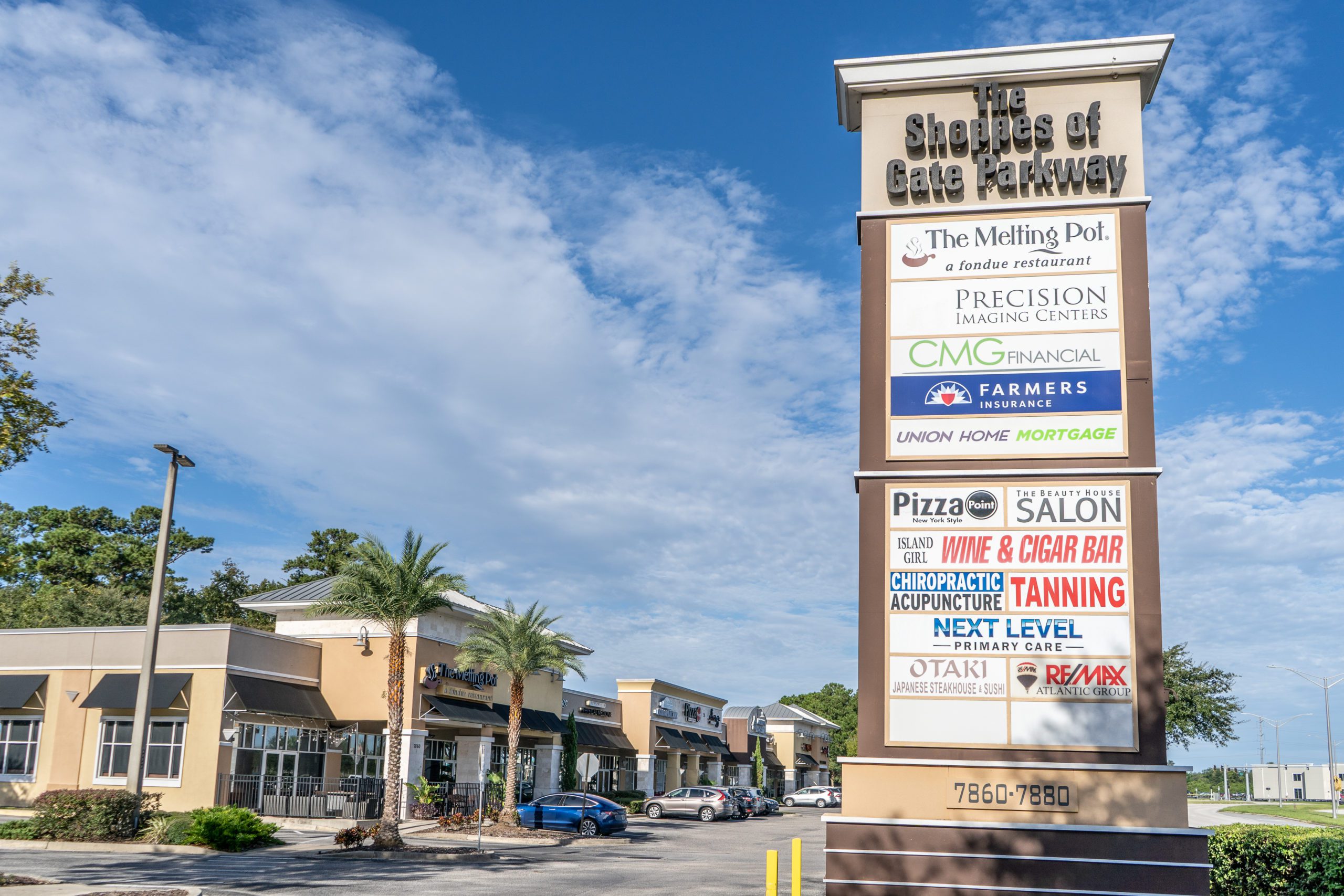 The signage and exterior of a retail shopping center.