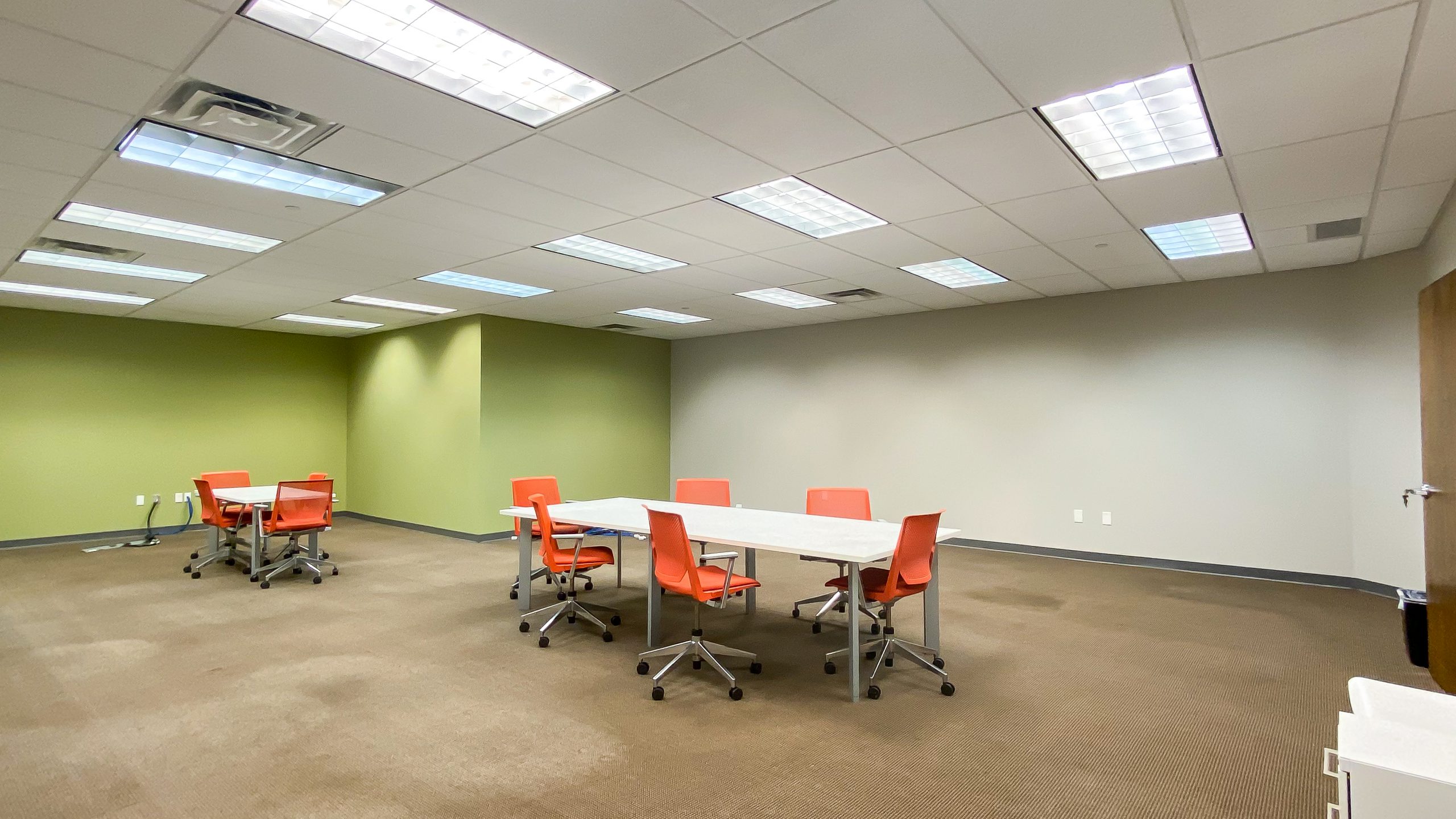 The interior of large center space of an office unit for lease.