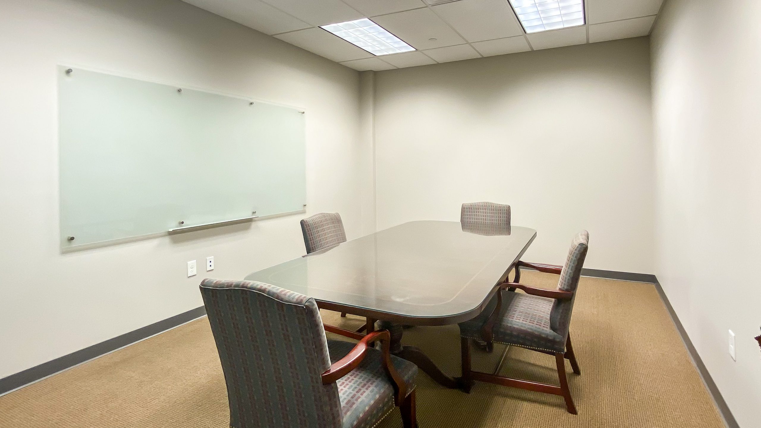 The interior of an office unit for lease.