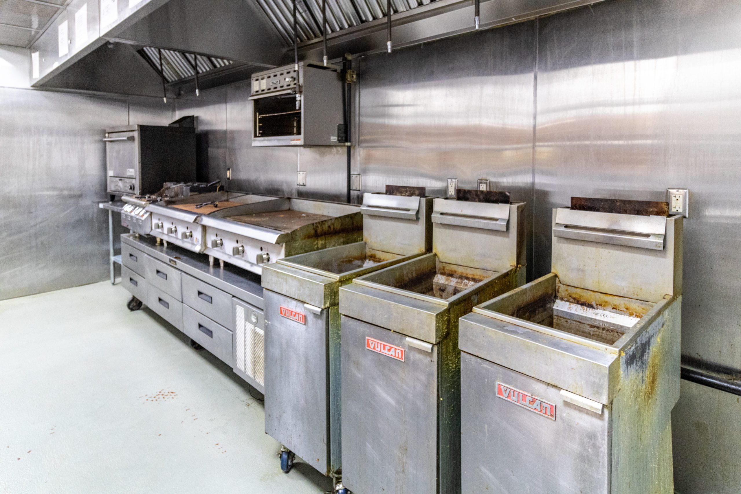 Commercial fryers and grills.