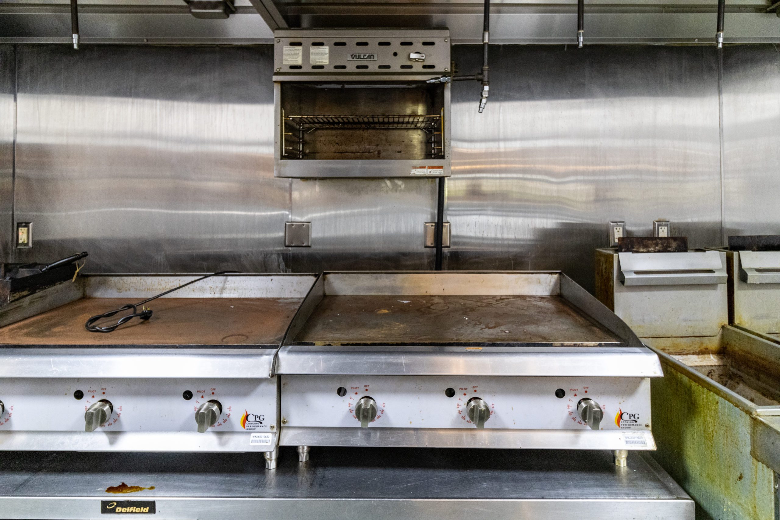 A commercial grill & hood.