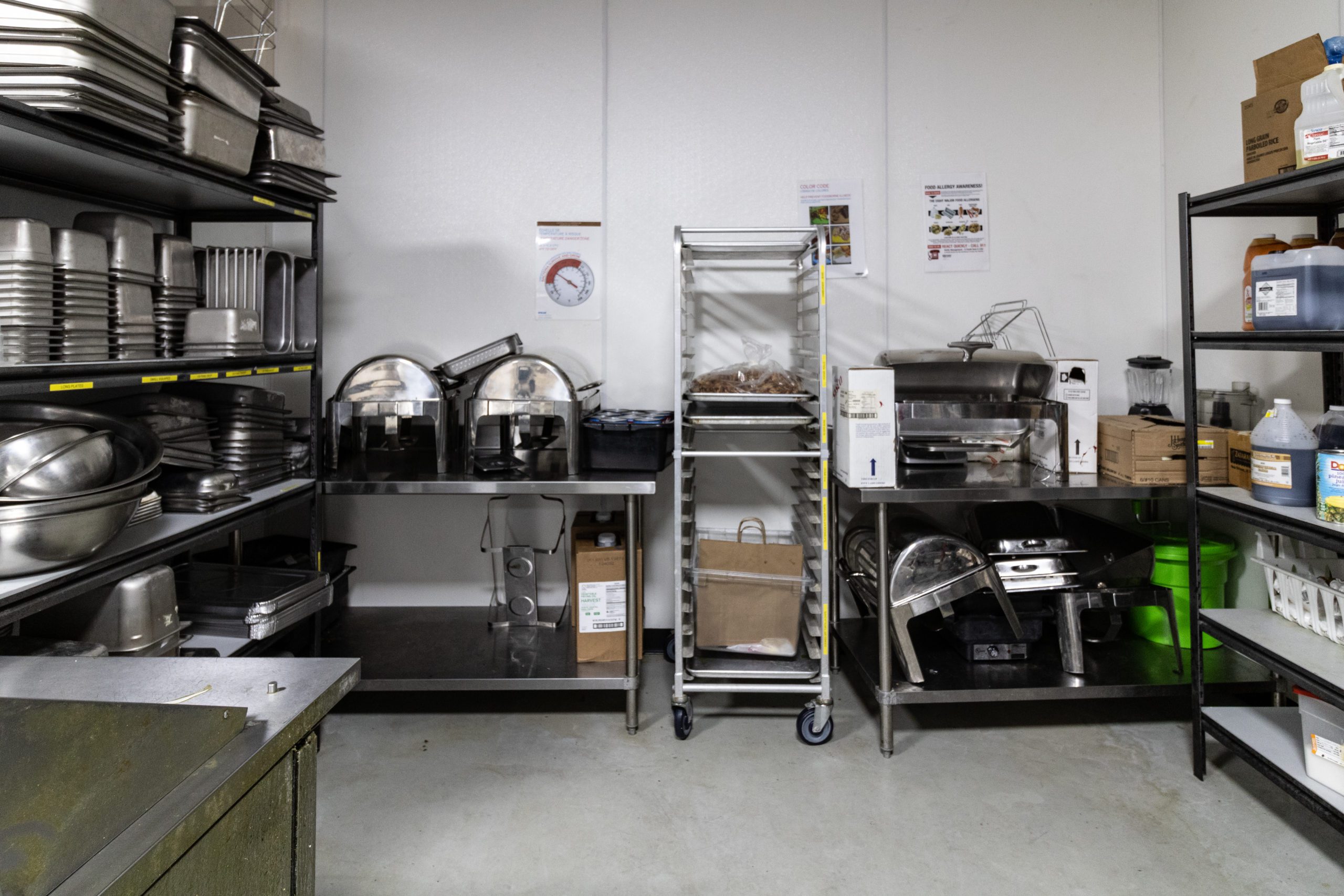Back-of-house restaurant with various commercial-grade equipment.