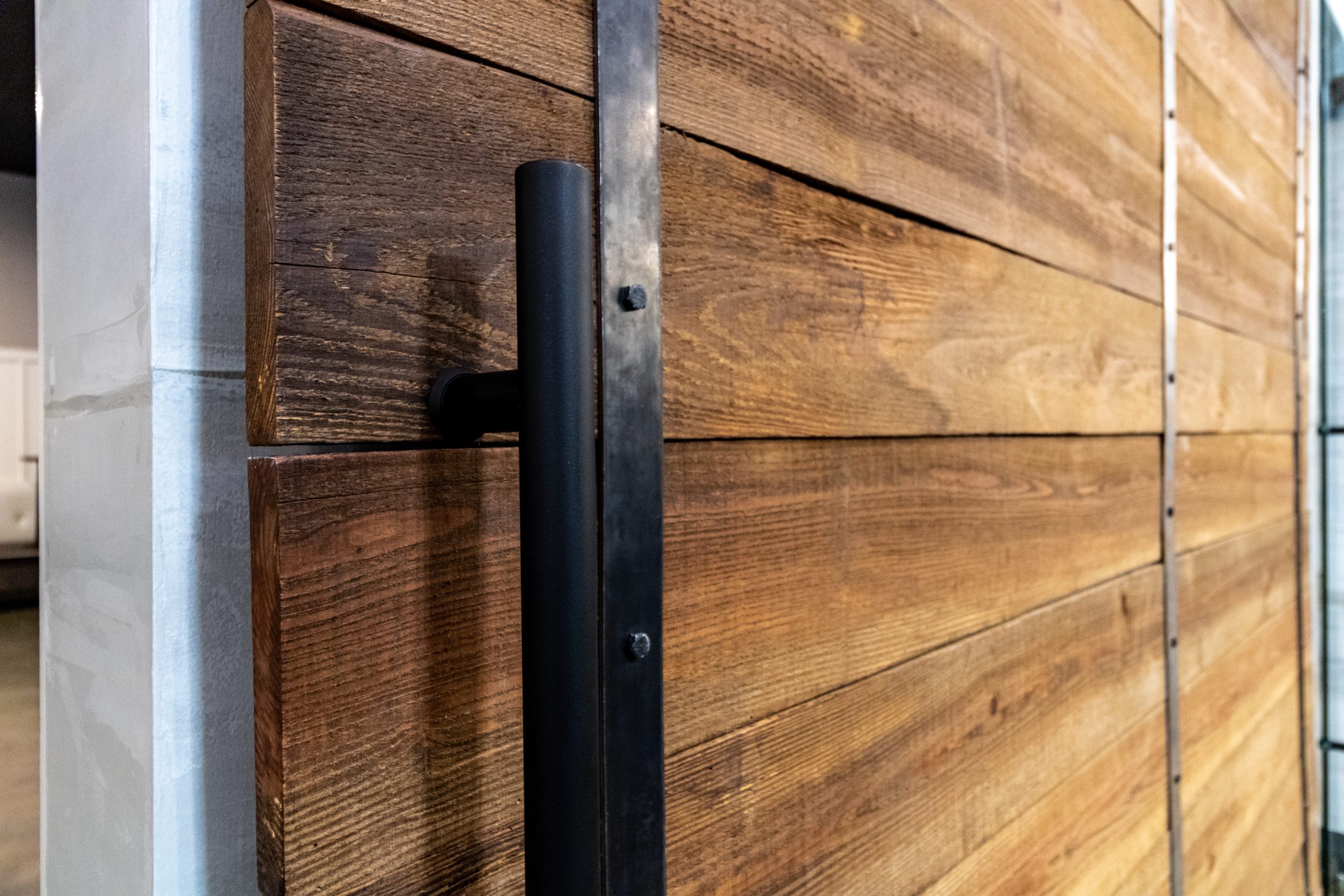 A close-up of a sliding wooden door